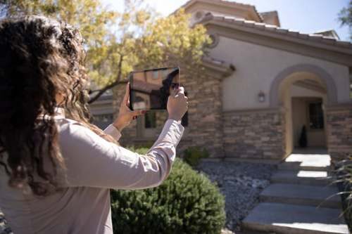 A Real Estate Agent or real estate appraiser real_estate_agent_appraiser